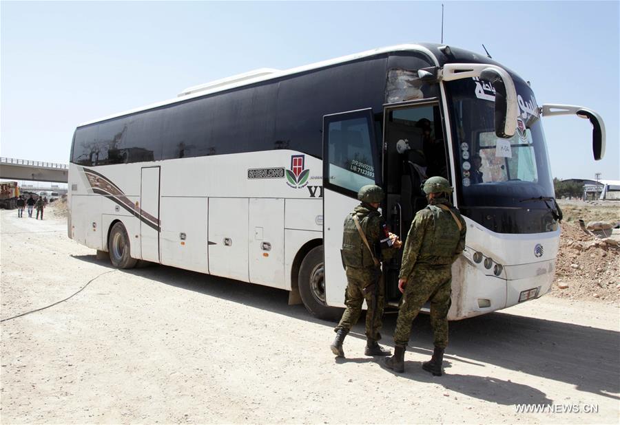 SYRIA-DAMASCUS-REBELS-EVACUATION