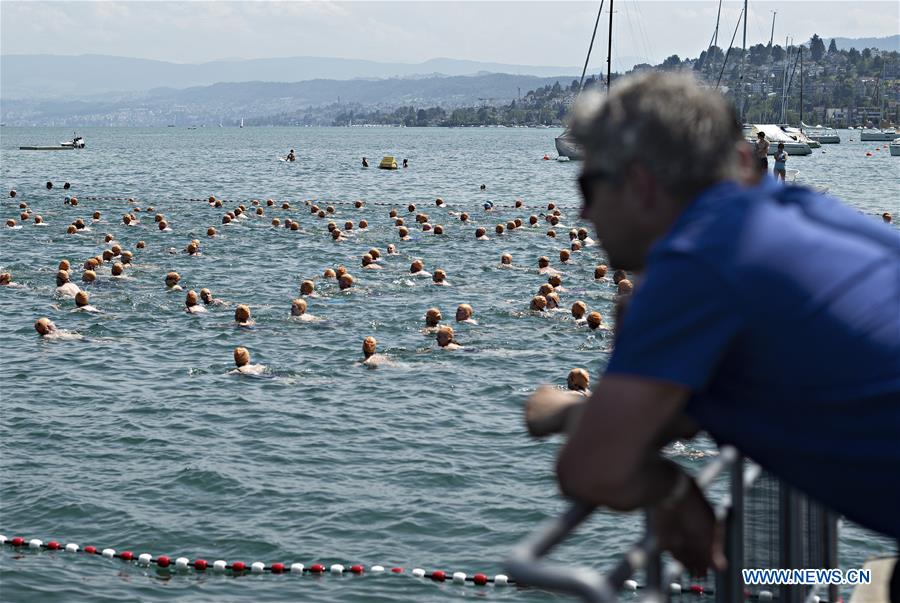 SWITZERLAND-ZURICH-LAKE CROSSING-SWIMMING