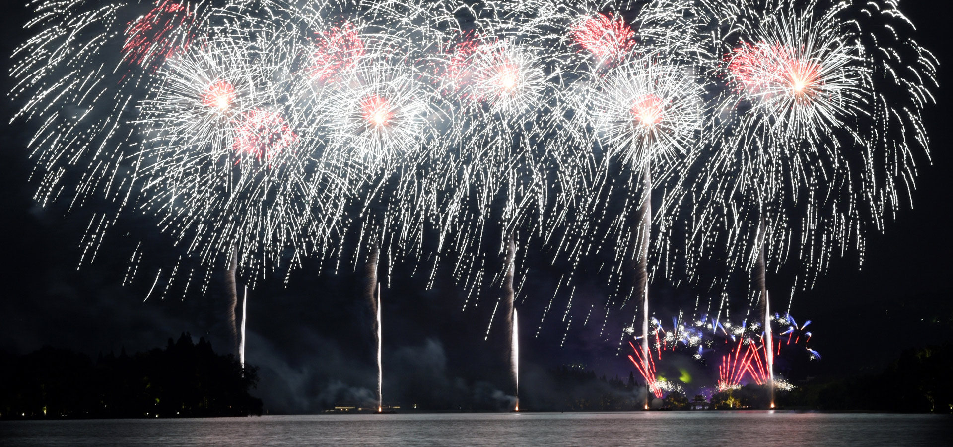 Fireworks light up sky over West Lake in Hangzhou