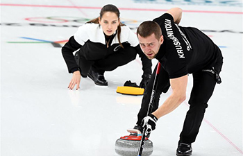 Olympic athletes from Russia claim bronze of mixed doubles curling match